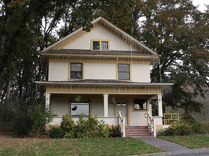 American foursquare home with a steep roofline